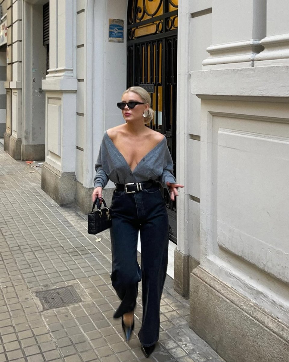 Laura Jade Stone wears black high-waisted jeans.