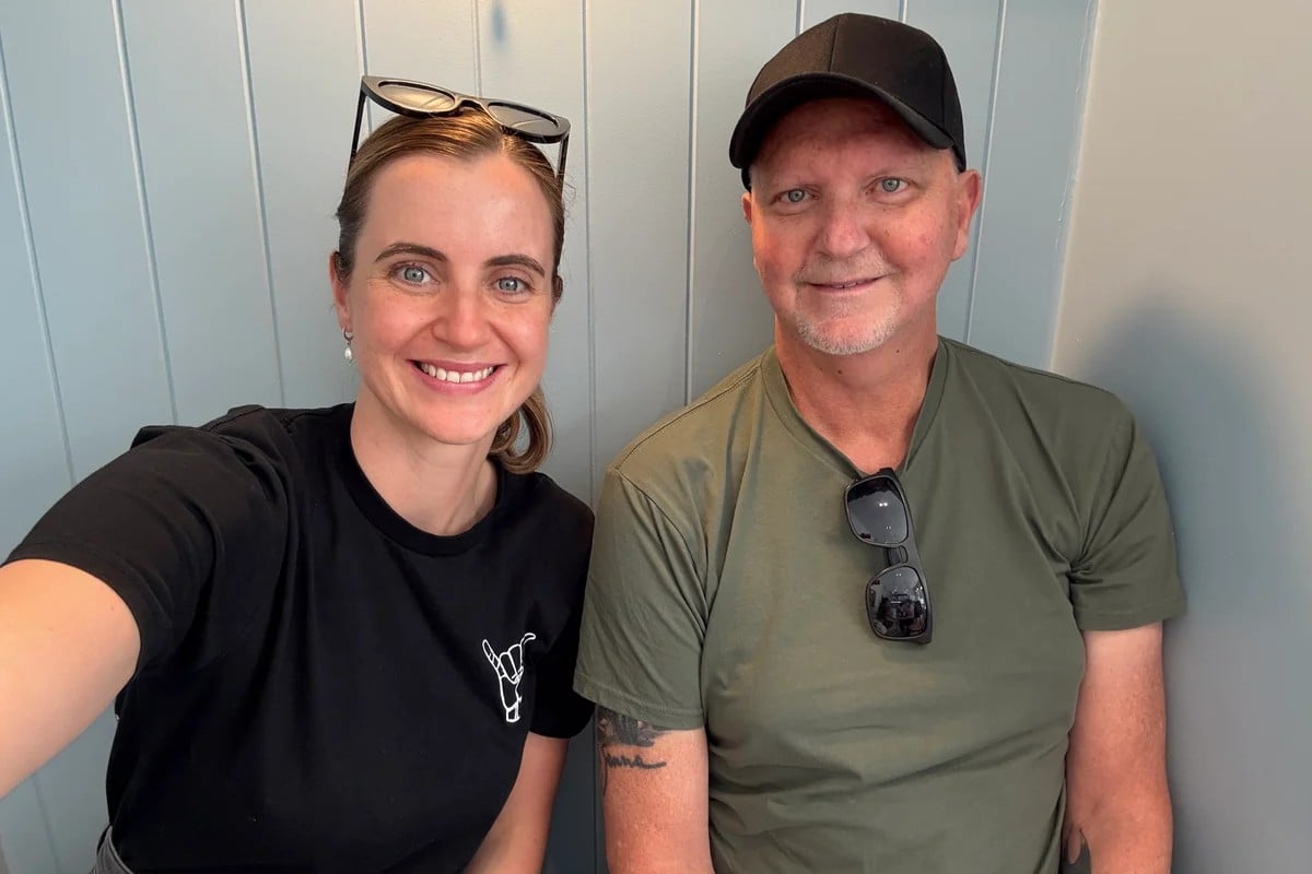 young-woman-talking-selfie-with-dad-wearing-khaki-shirt
