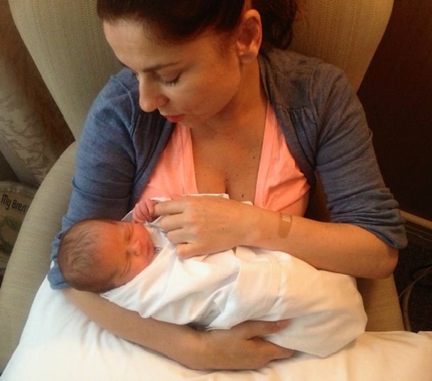 Mary Coustas holding her baby Jamie 