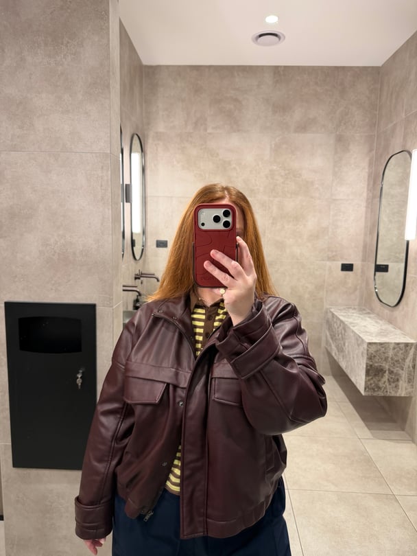 Amy Clark wearing target bomber leather jacket.