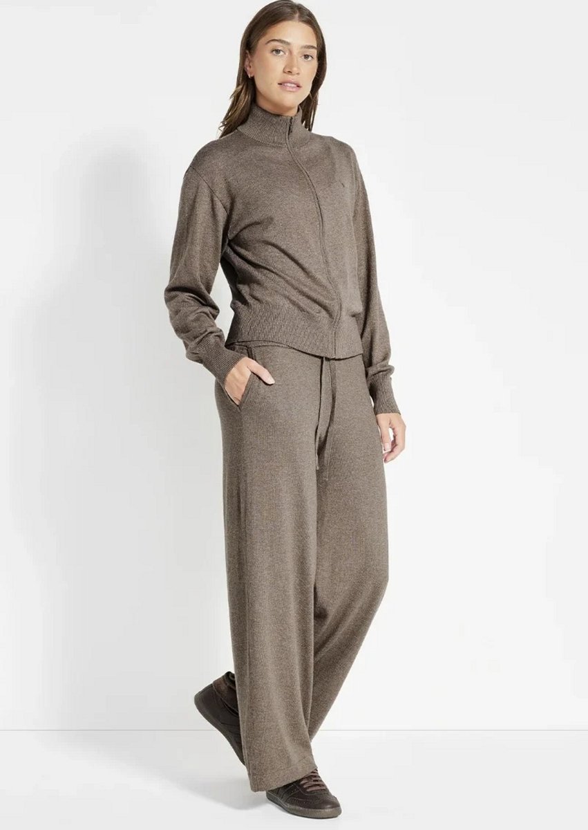 woman in a matching marle tracksuit from Nimble 