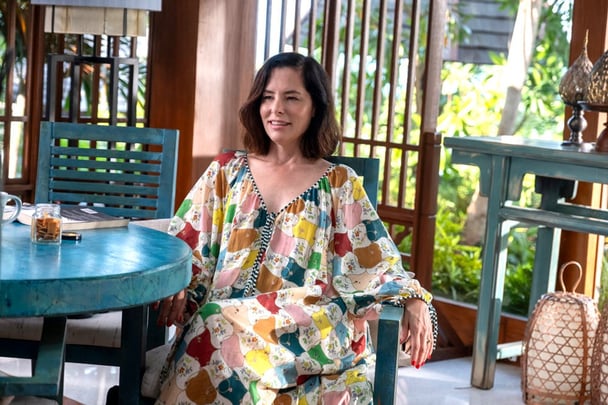 Parker Posey wears an Alemais Pool Dress