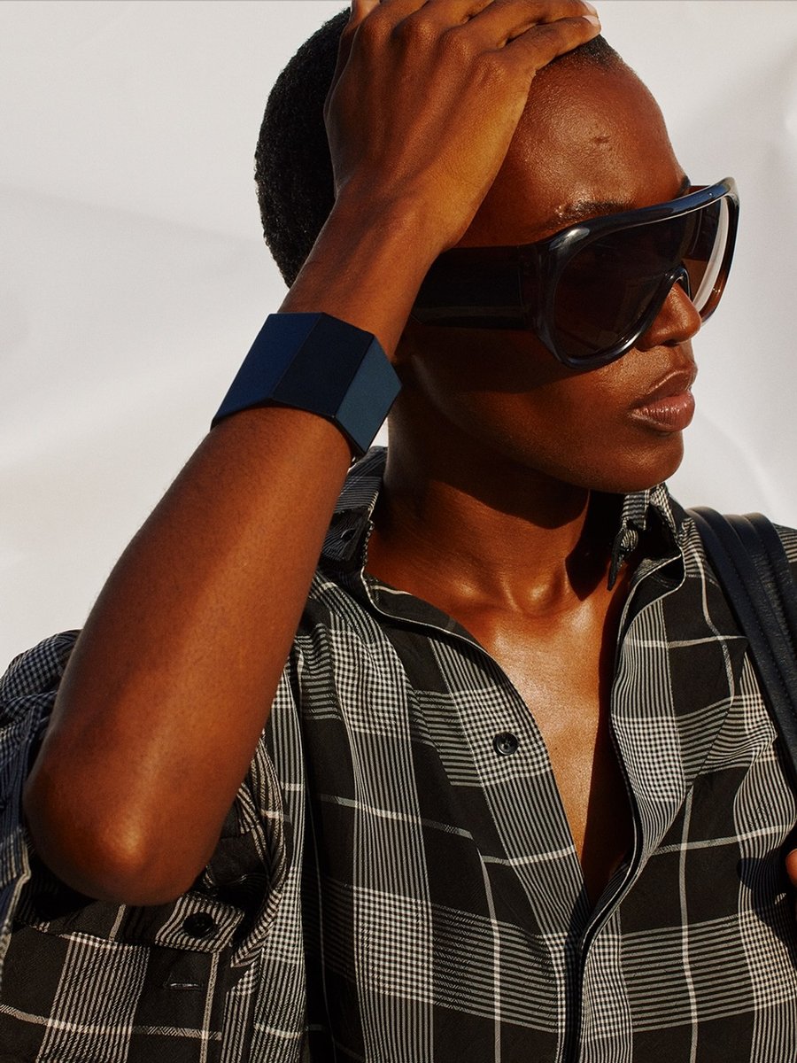 A look from Phoebe Philo's new collection featuring shield sunglasses.