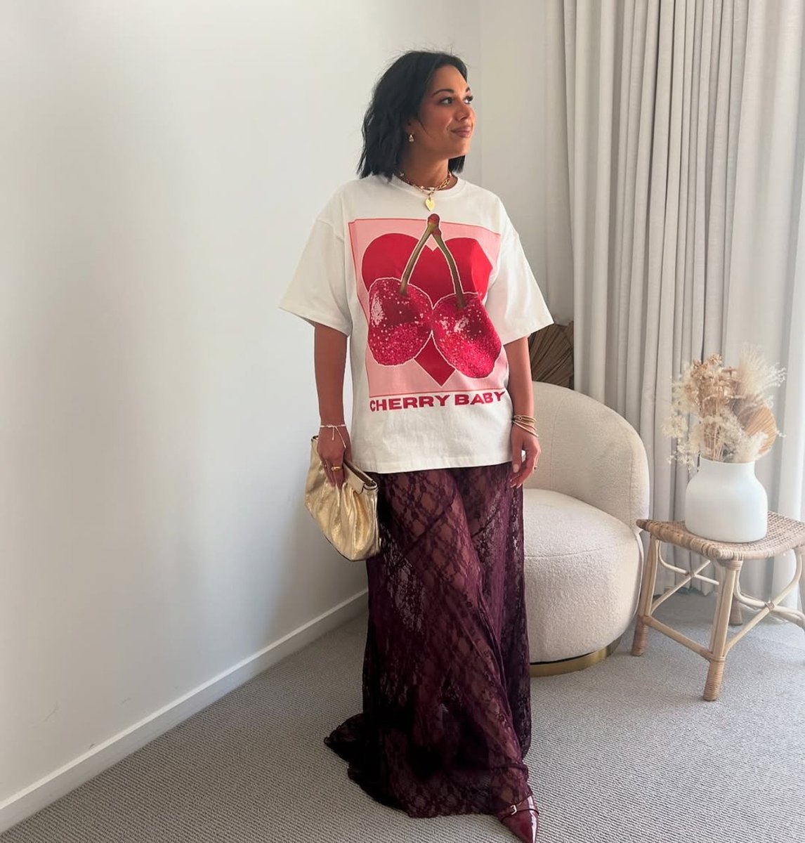 Stylist Emelia Morris teams a graphic tee with a lace maxiskirt