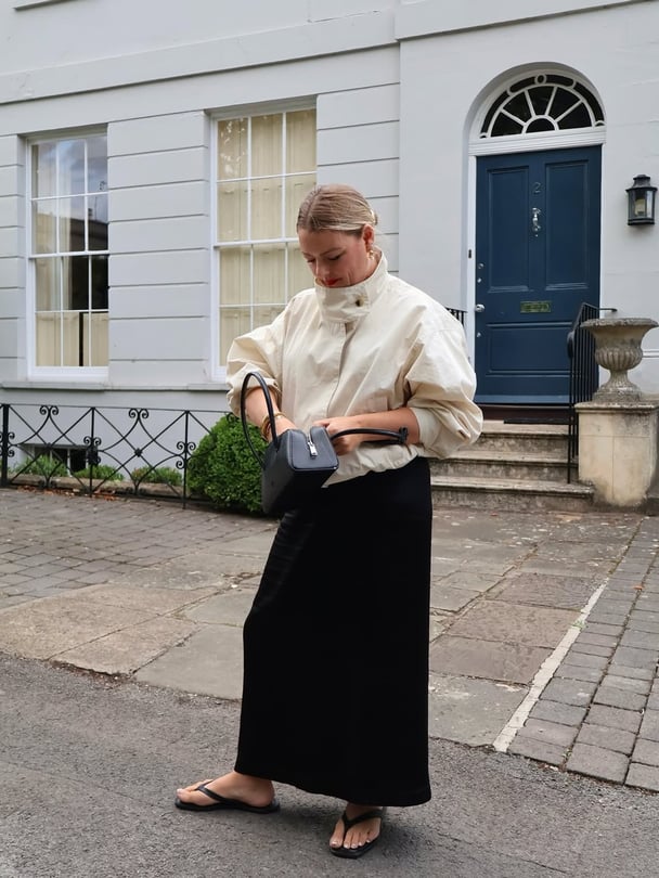 Sam Preston wears a chic outfit.