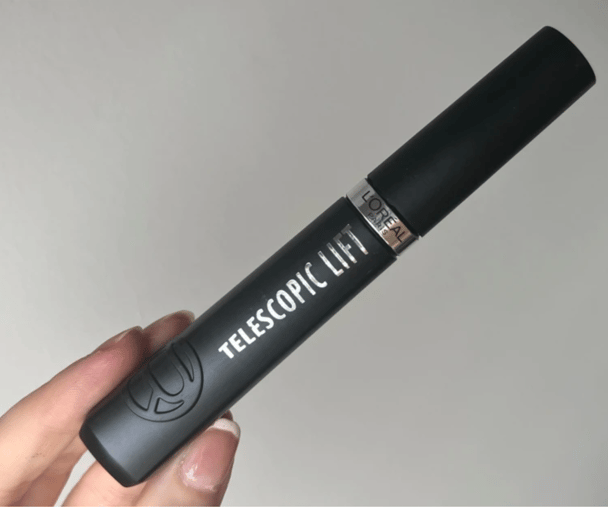 Woman's hand holding L'Oreal Paris Telescopic Lift Mascara