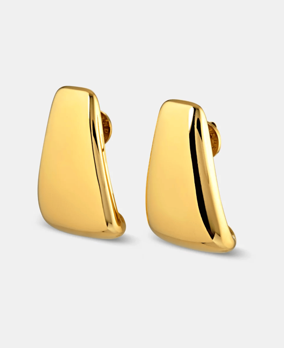 Chunky gold metal earrings in a rectangular shape.