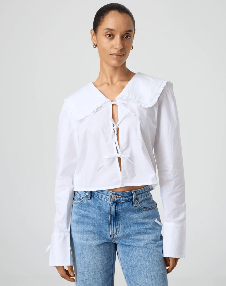A glassons shirt is featured with a large collar and tie-up front detail.