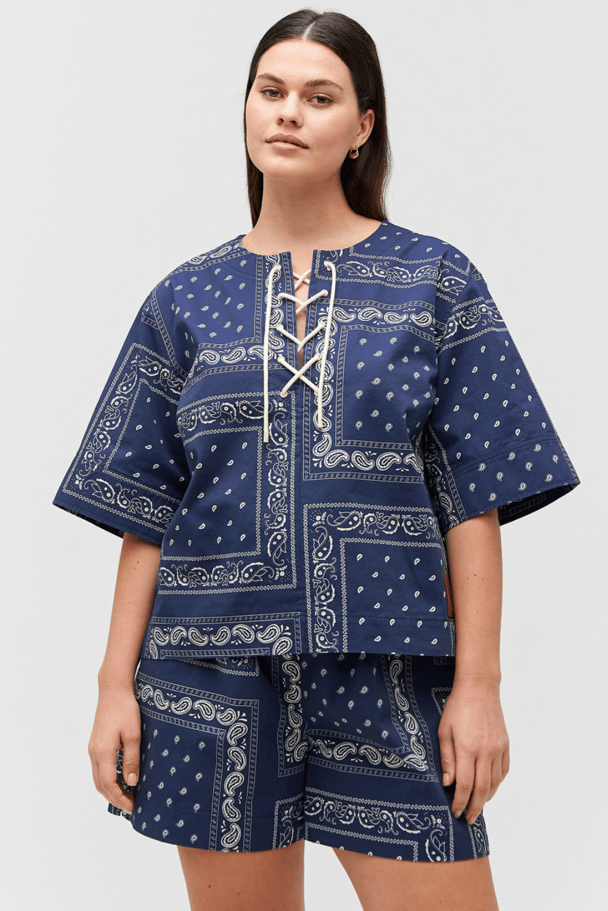 A navy and white bandana-print set featuring tie-up details.