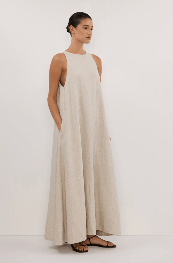 A stone-coloured linen maxi dress with high neck.