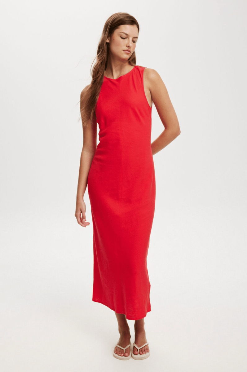 A bright red, fitted, high neck midi dress.