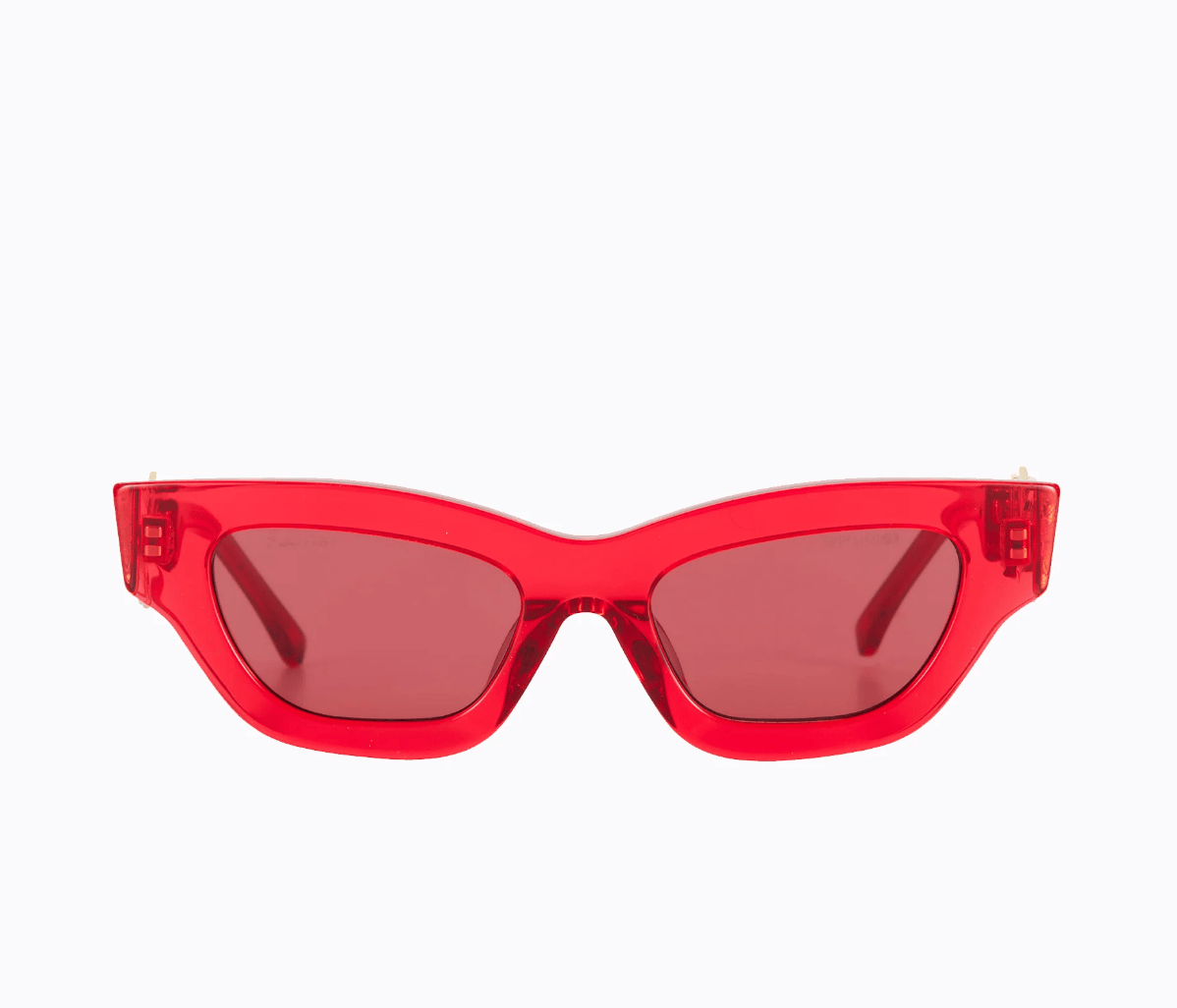 Red transparent cat-eye sunglasses from Poppy Lissiman.