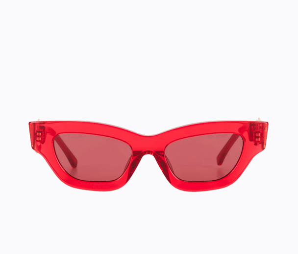 Red transparent cat-eye sunglasses from Poppy Lissiman.