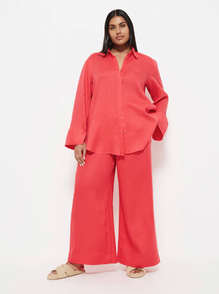 A pair of wide-leg linen pants in bright red.