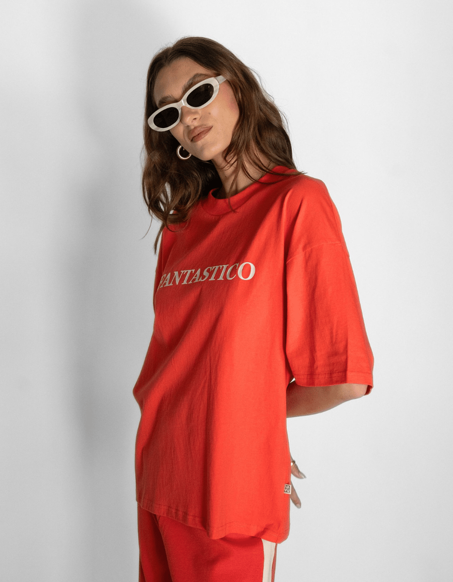 An oversized red t-shirt with the word 