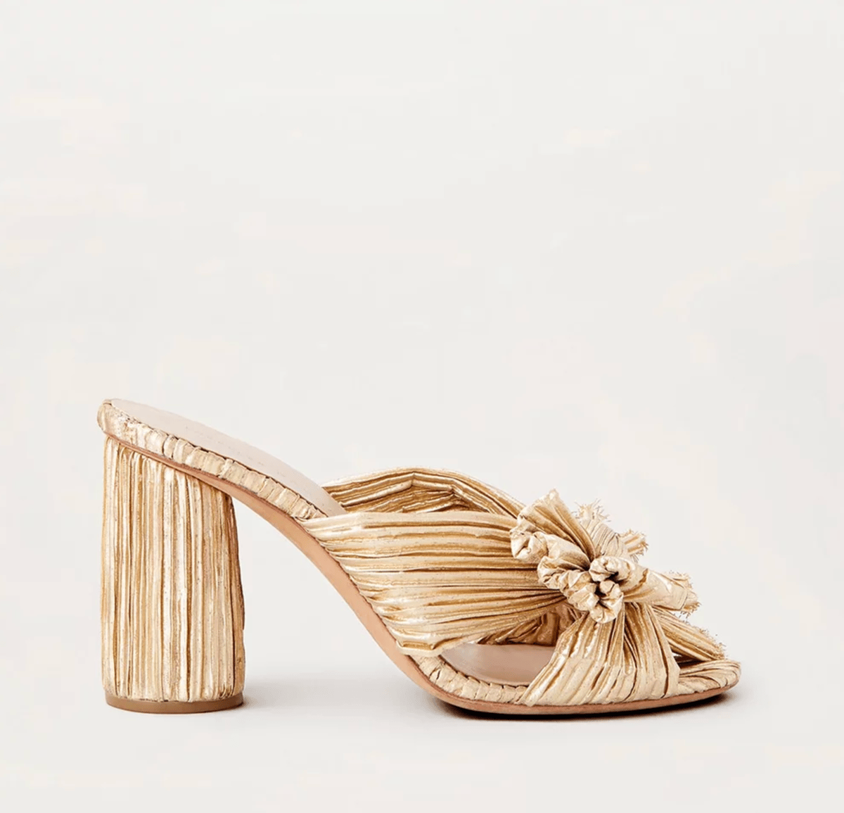 Loeffler Randall's pleated lame heels, with a cylindrical block heel and knotted accent at front.