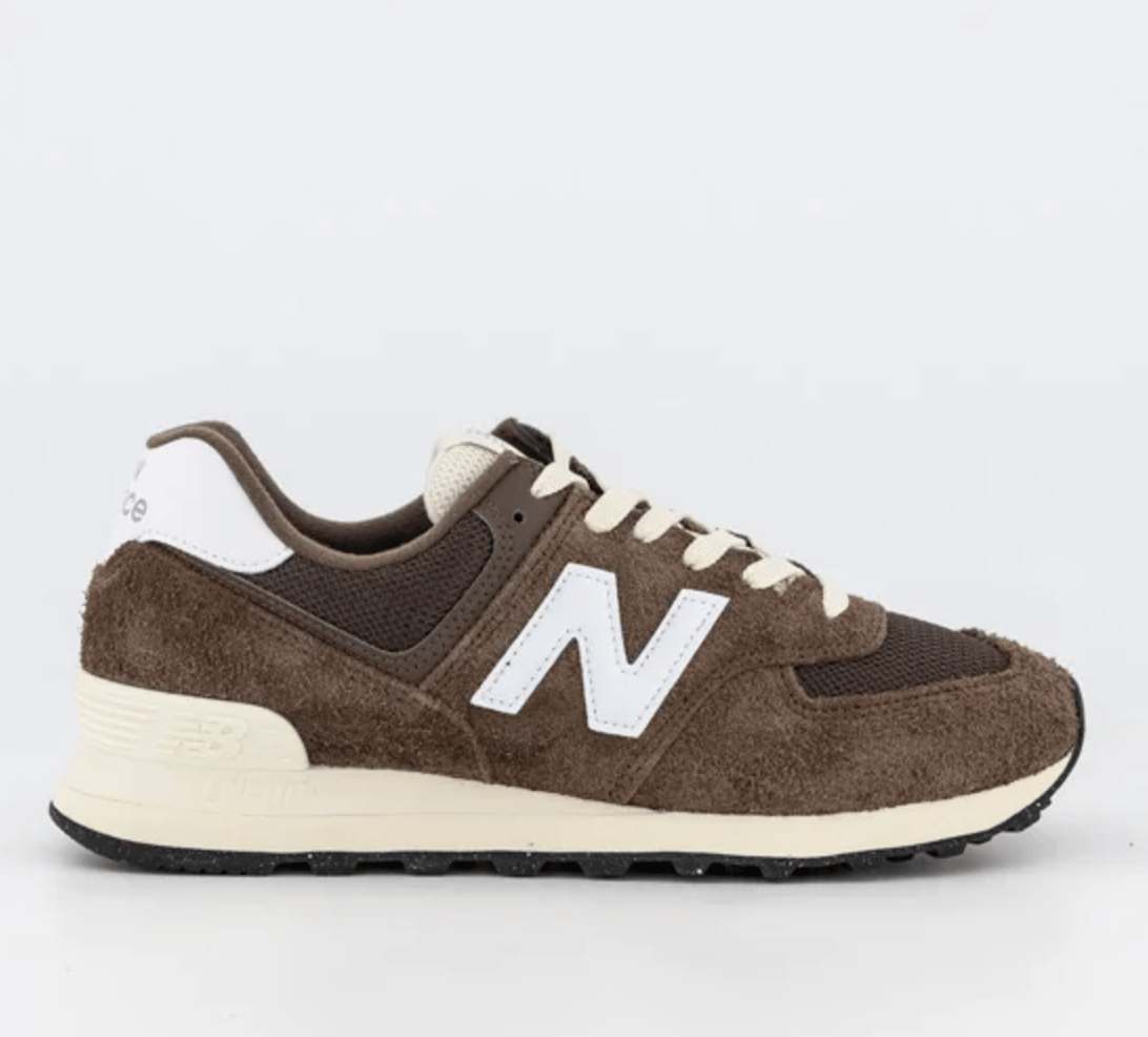 The New Balance 574 in brown suede.