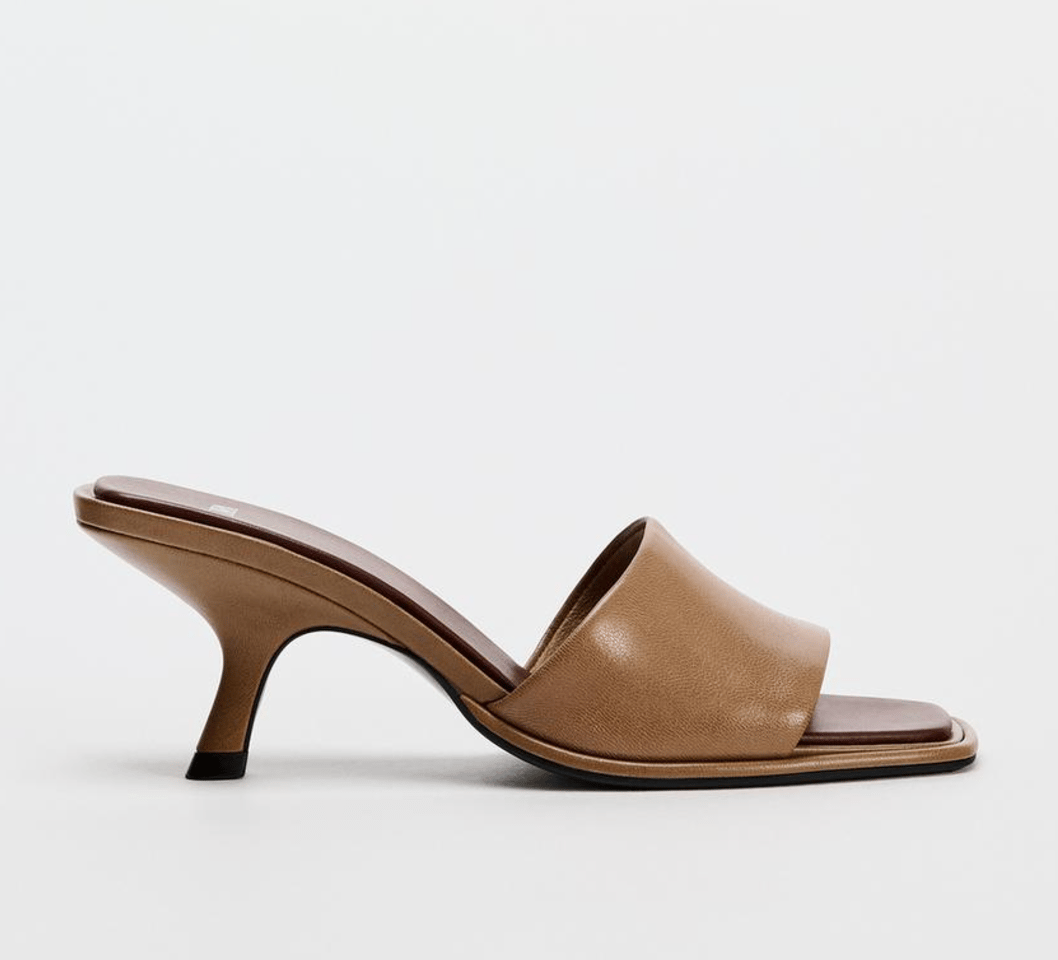 A brown leather mule heel by Zara.