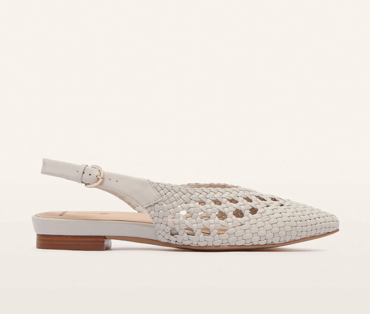 A woven white leather pointed flat shoe