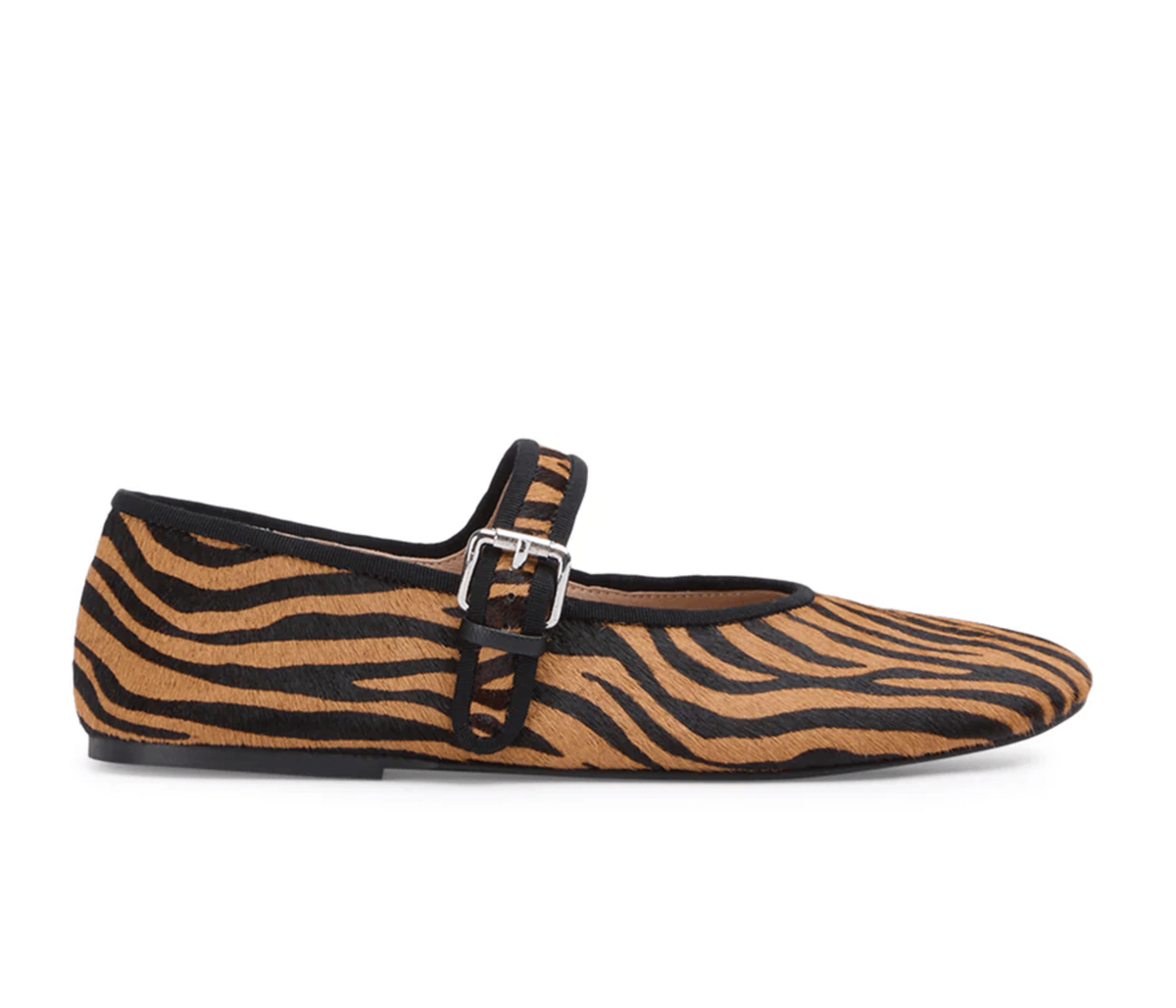 Zebra-print ponyhair mary jane flats.