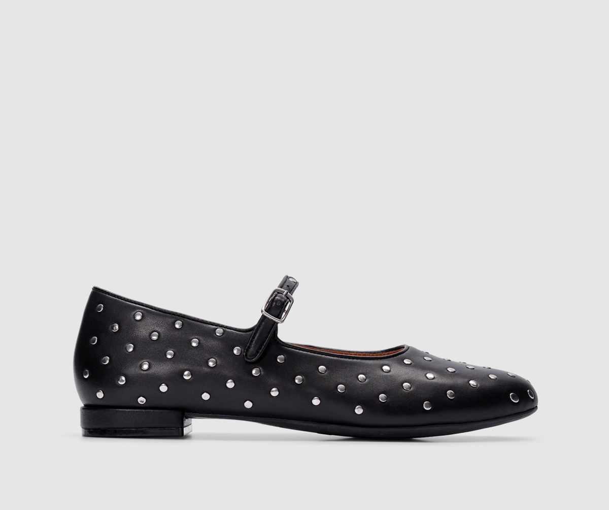 Black leather Mary Jane flats with silver stud embellishment.