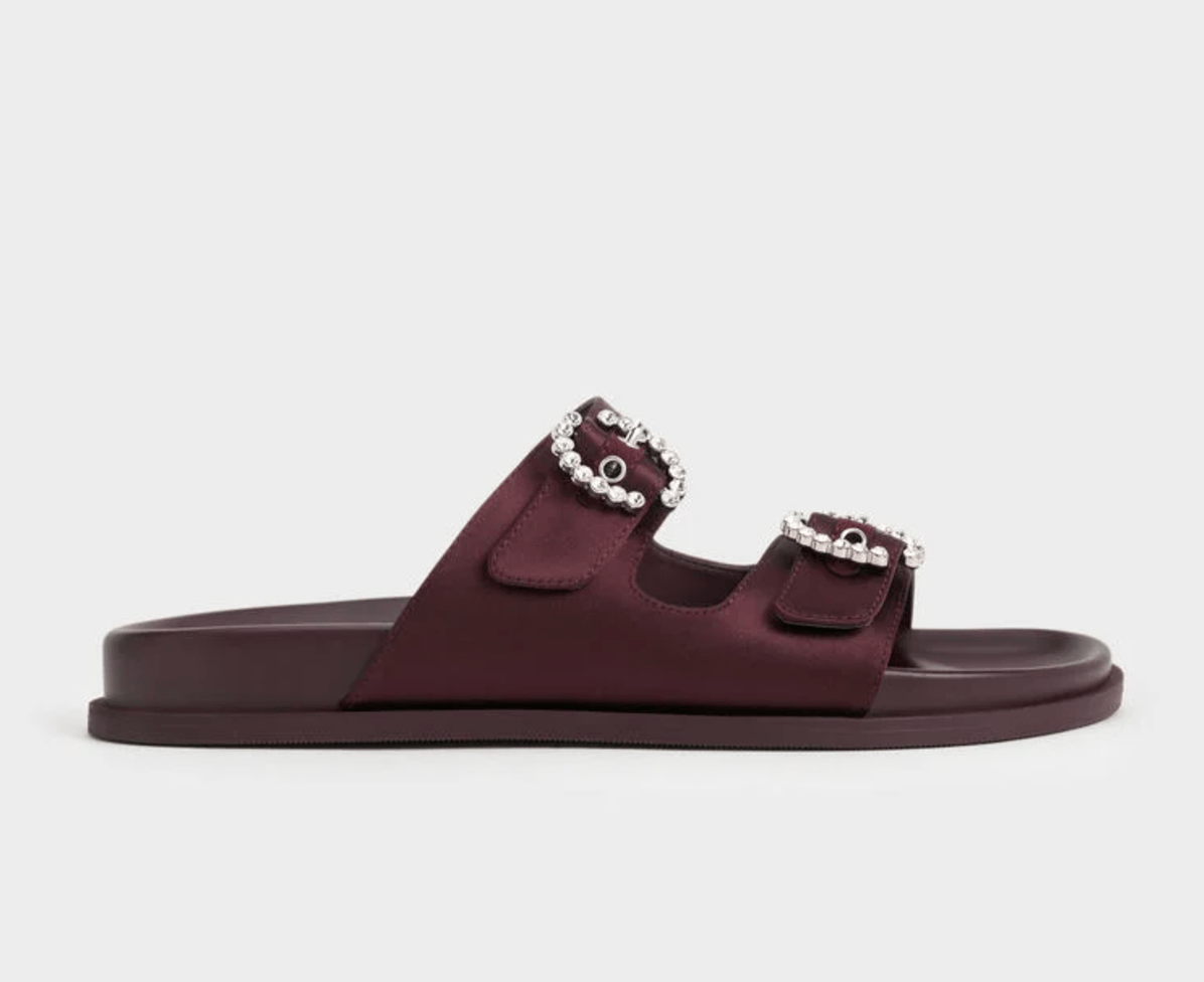 Burgundy satin embellished buckle slides.