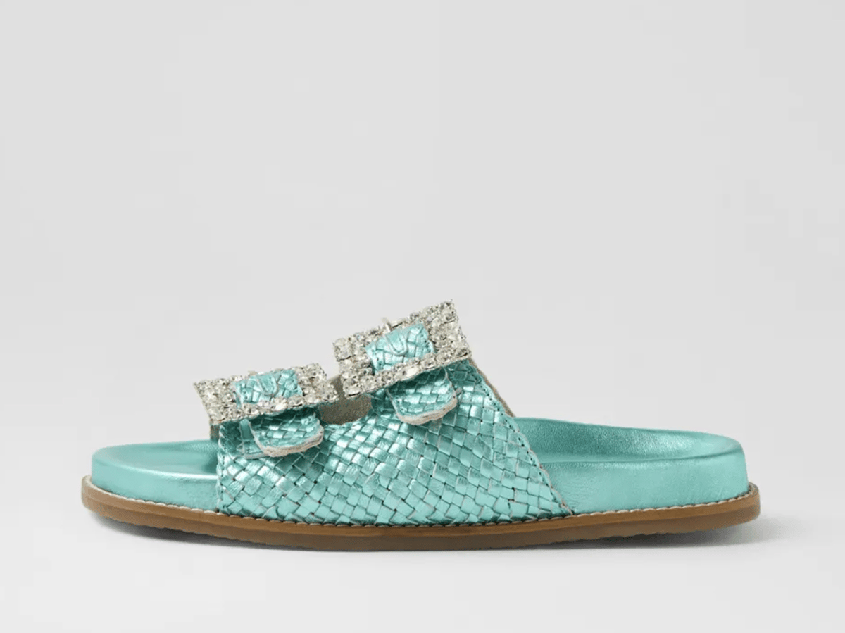 Aqua blue leather braided sandals with embellished buckles.