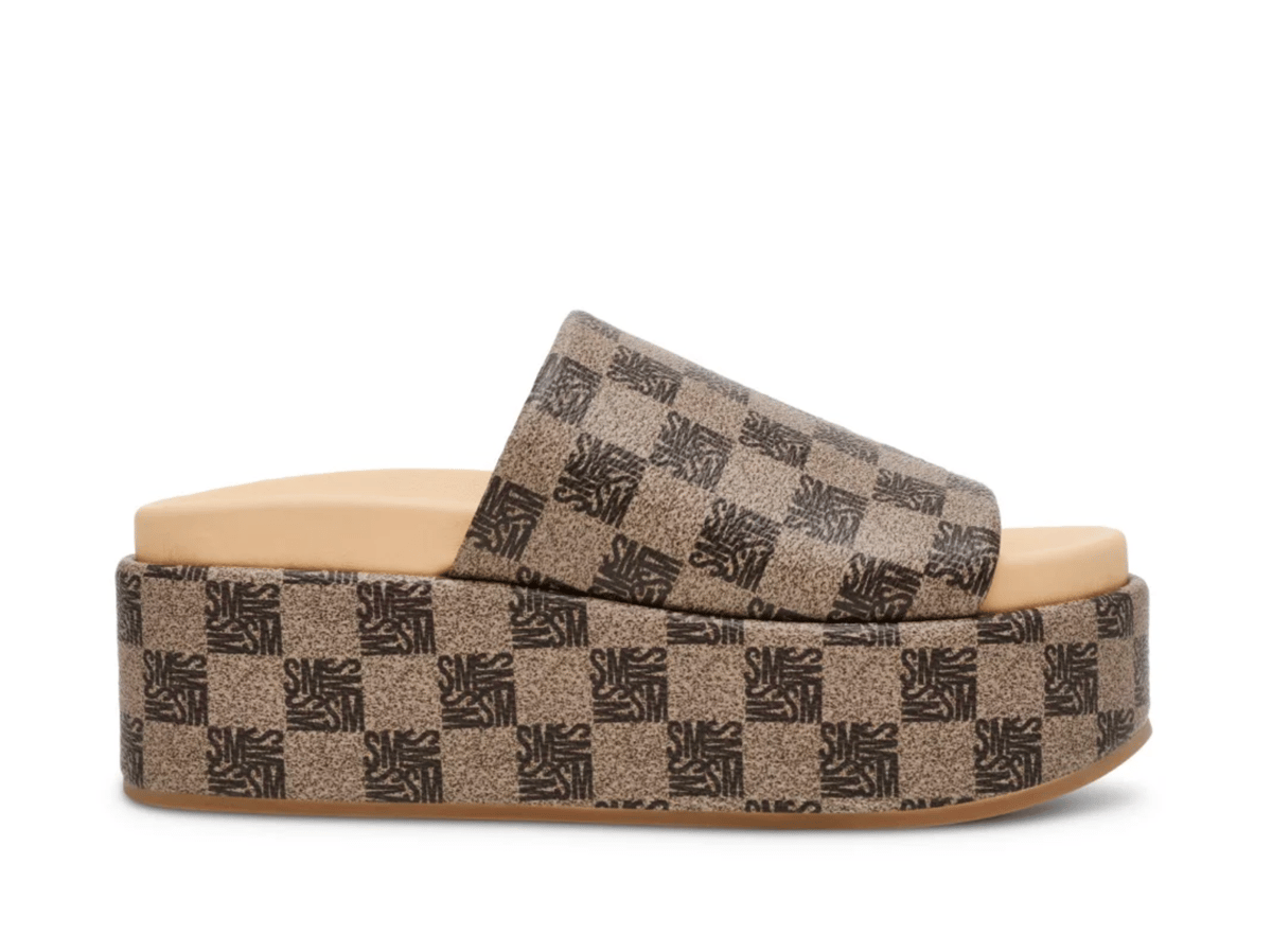 A pair of checked brown flatforms.