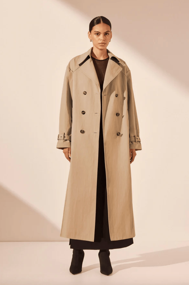 A beige oversized trench coat