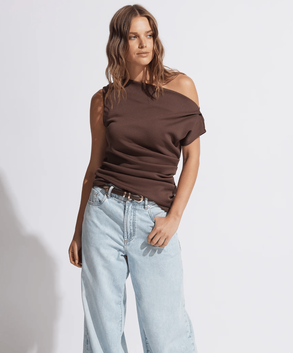 A draped brown off the shoulder tank top.