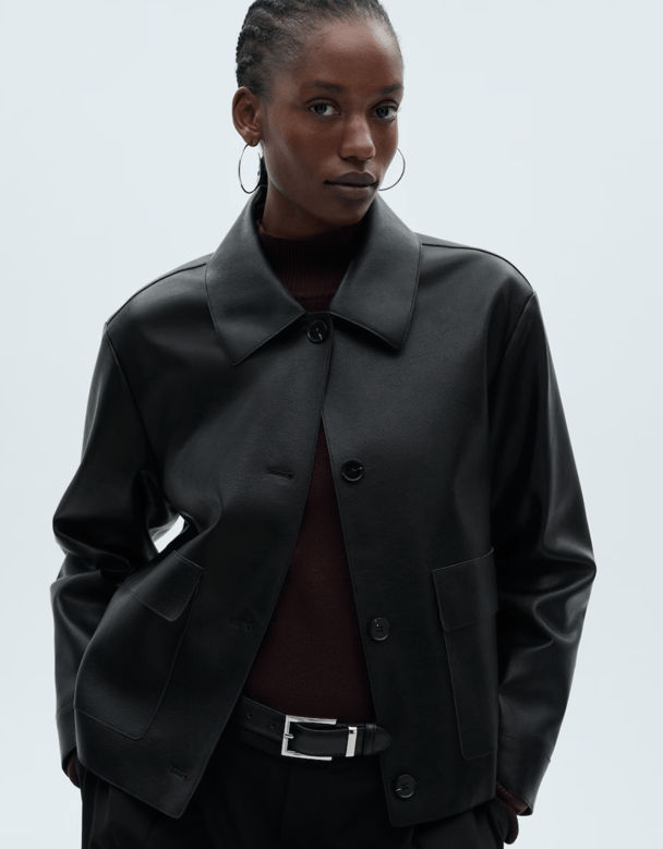 A faux leather black cropped jacket.