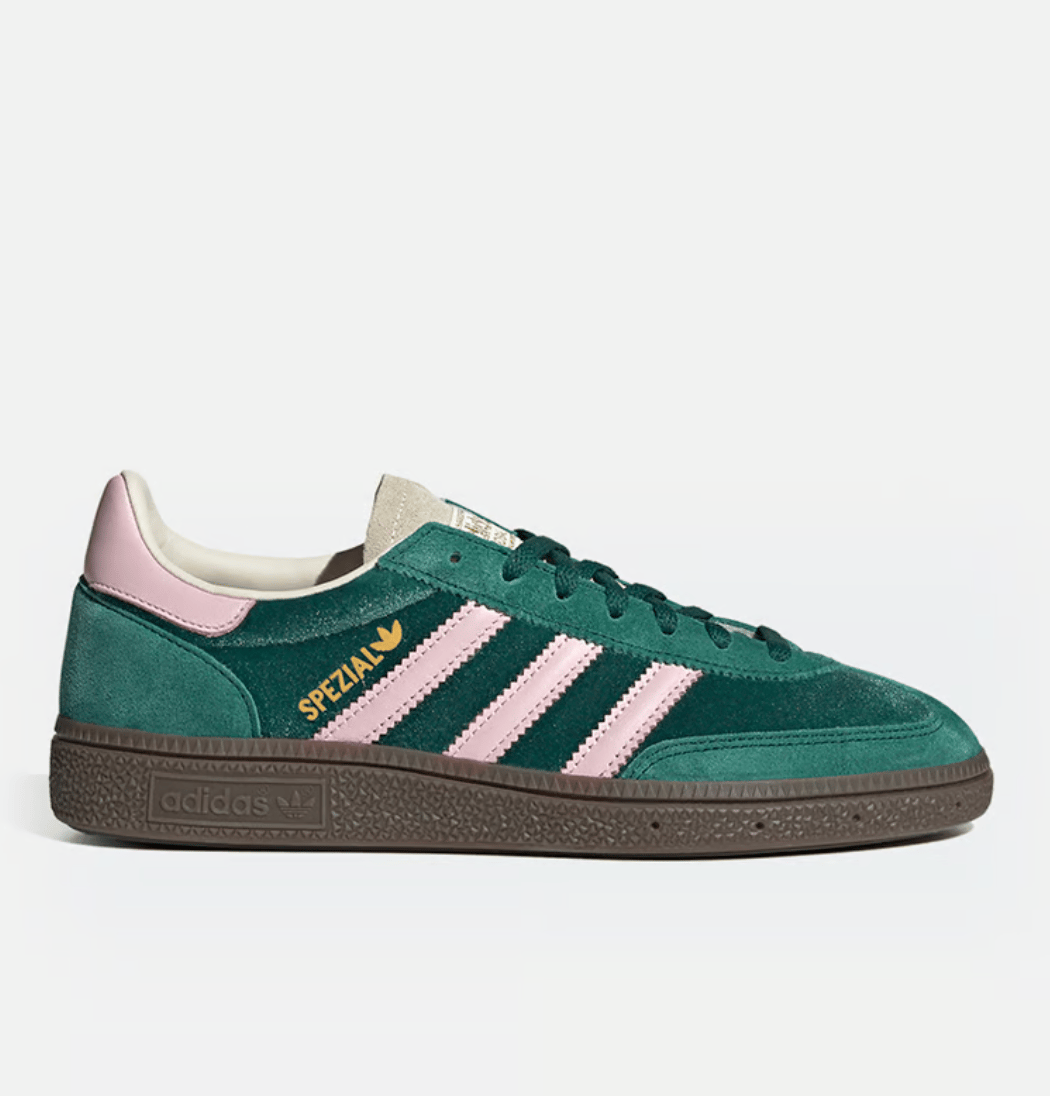 Adidas Spezial sneakers in forest green with pink stripe.