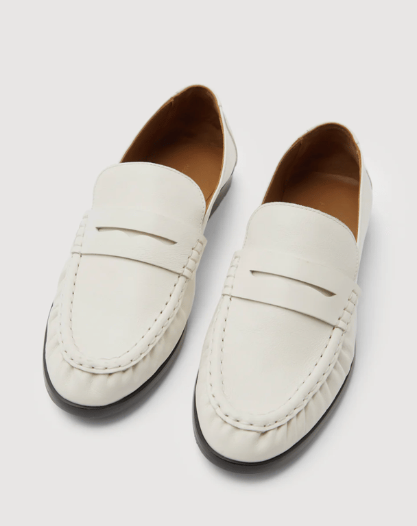 Assembly Label white leather loafers.