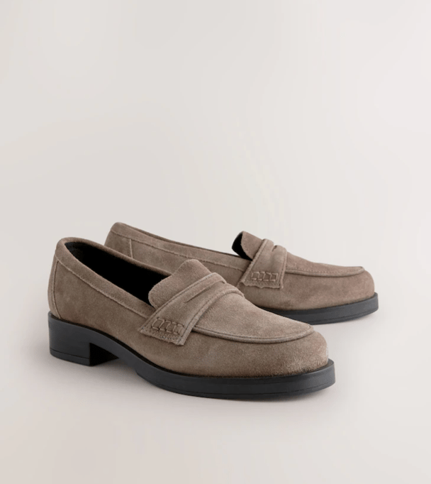 Taupe suede loafers.
