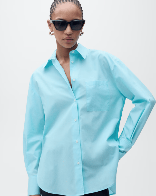 Light blue oversized collared shirt.