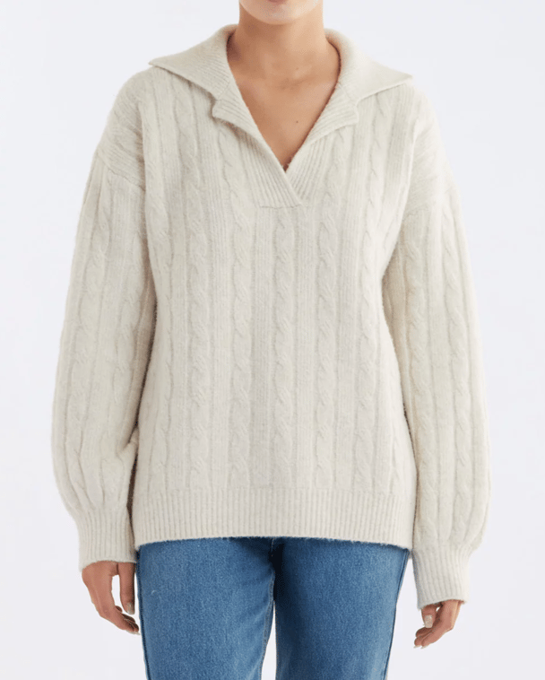 Amelius cable knit collared jumper.