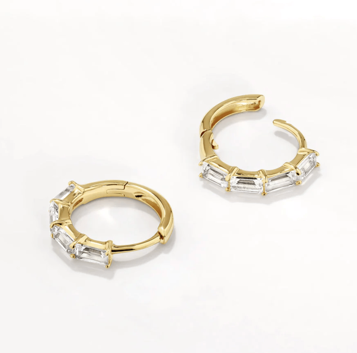 Medley White Topaz Huggies.