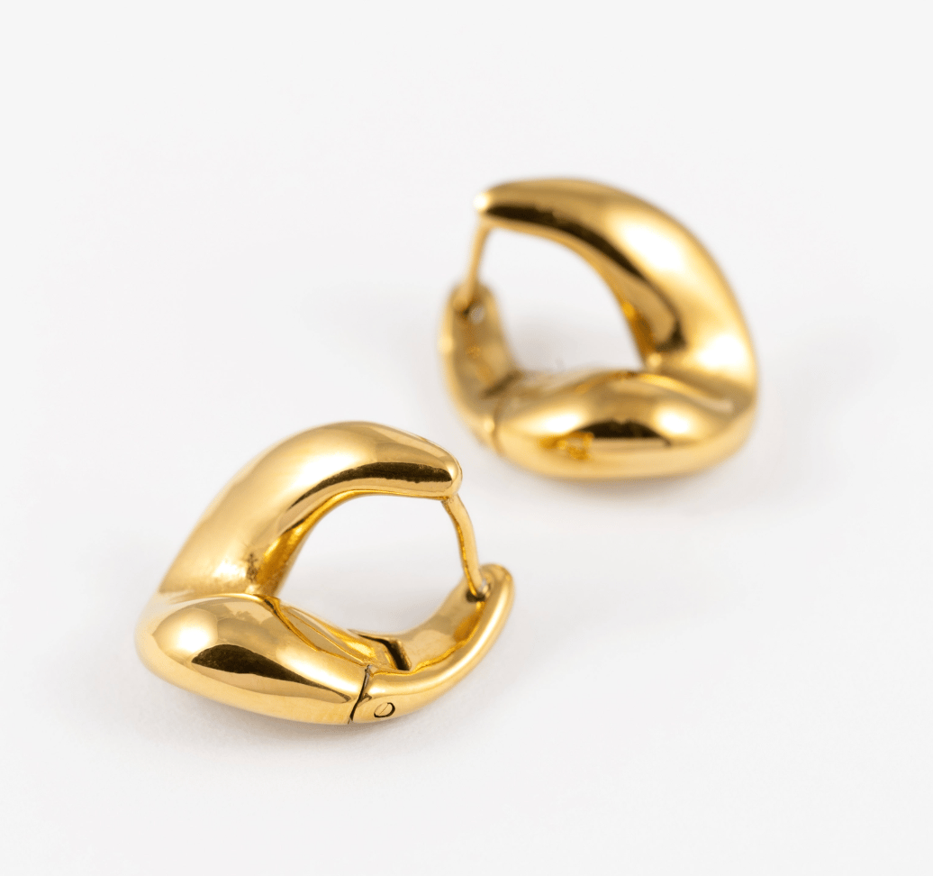 Harli & Harpa Gold Twist Huggie Hoop Earrings.