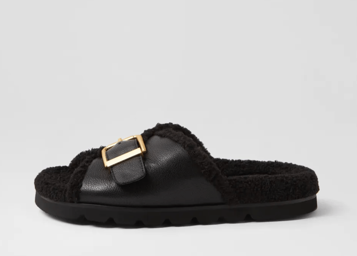 Midas shearling slides.