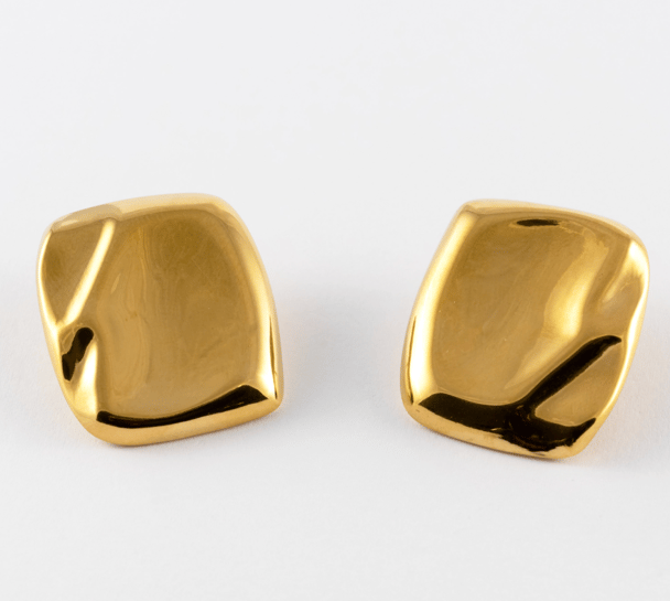 Harli + Harpa statement gold earrings.