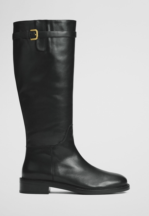 Black calf-length boots are trending.