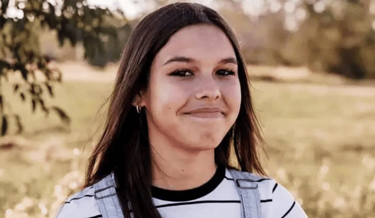 Young girl smiling.