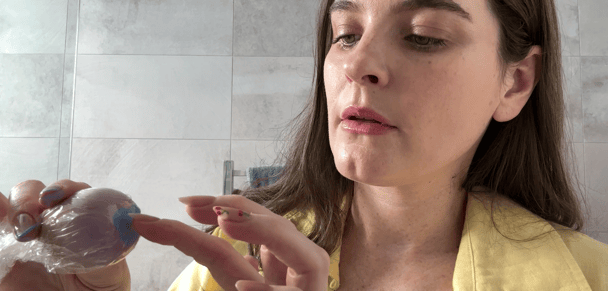 mamaia's beauty editor Erin Docherty trying the French manicure sponge hack.