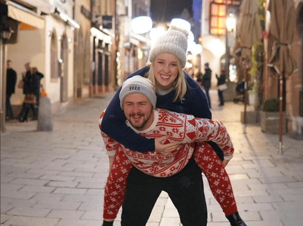 In 2017, Abbie married her teenage love, Karl Sundgren. Karl is piggybacking Abbie at Christmastime.