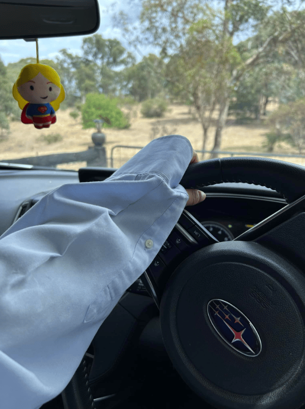You Beauty Facebook member Denise Pitcher Clark shows off her $1 shirt hack for sun protection while driving.