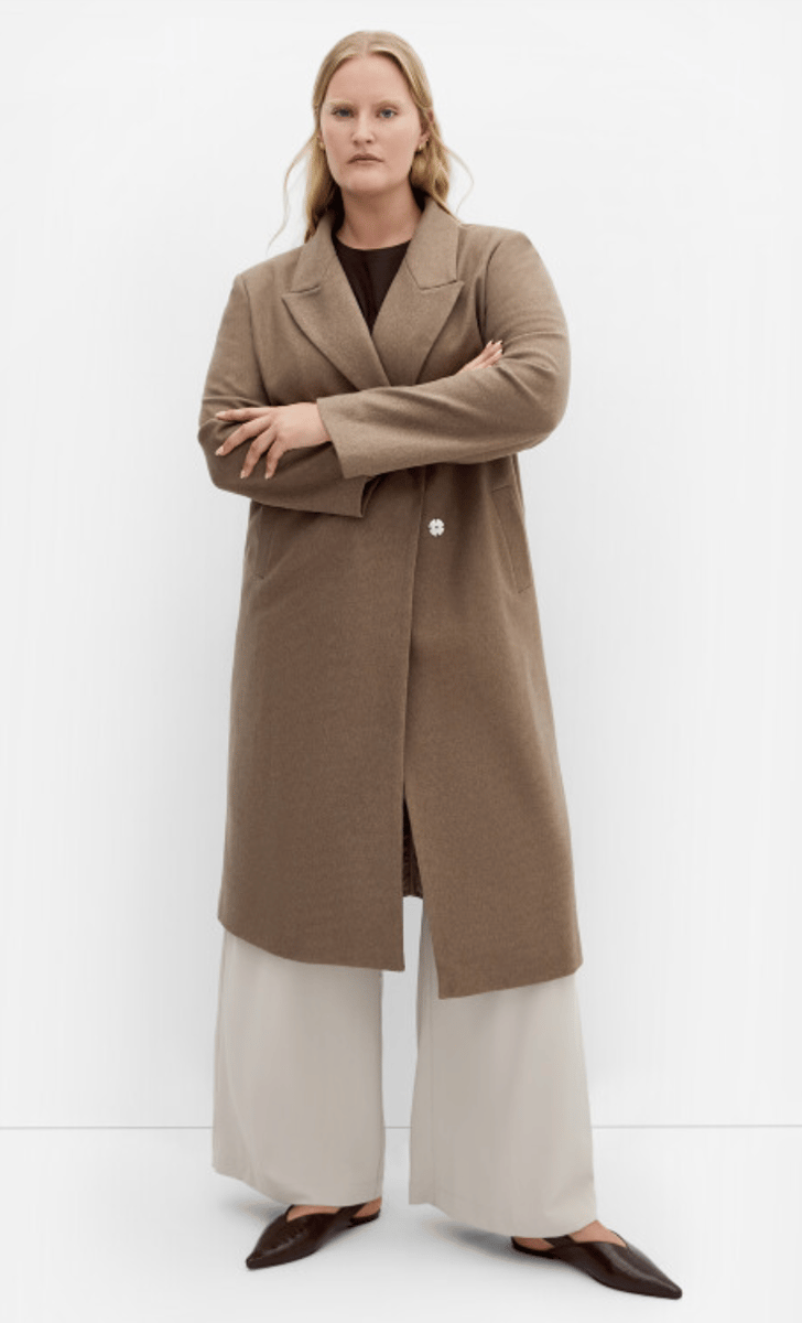 woman wearing maxi coat in taupe from city chic