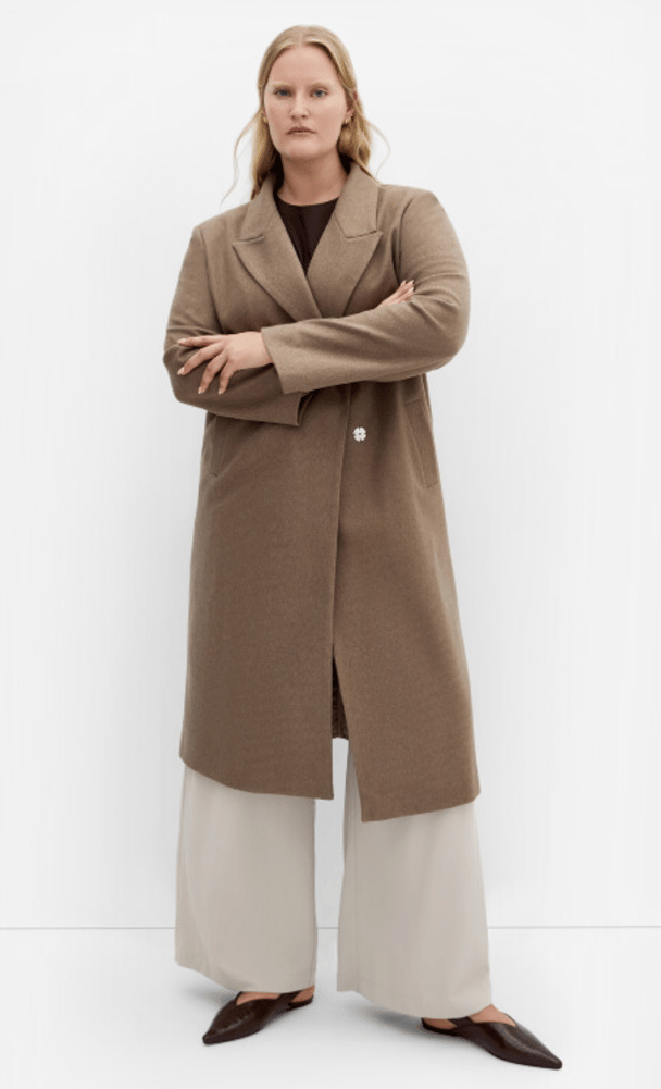 woman wearing maxi coat in taupe from city chic