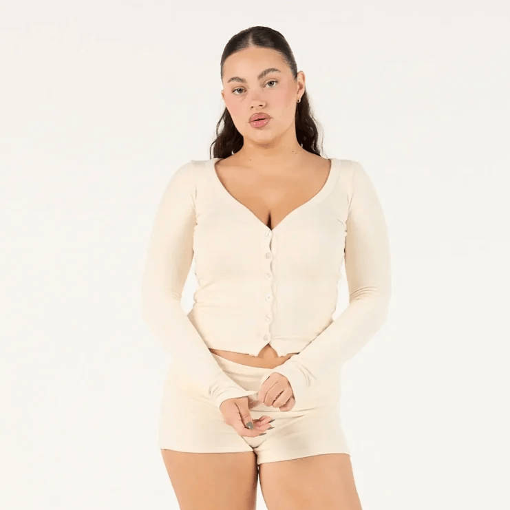 woman wearing brown cardigan from Remmie