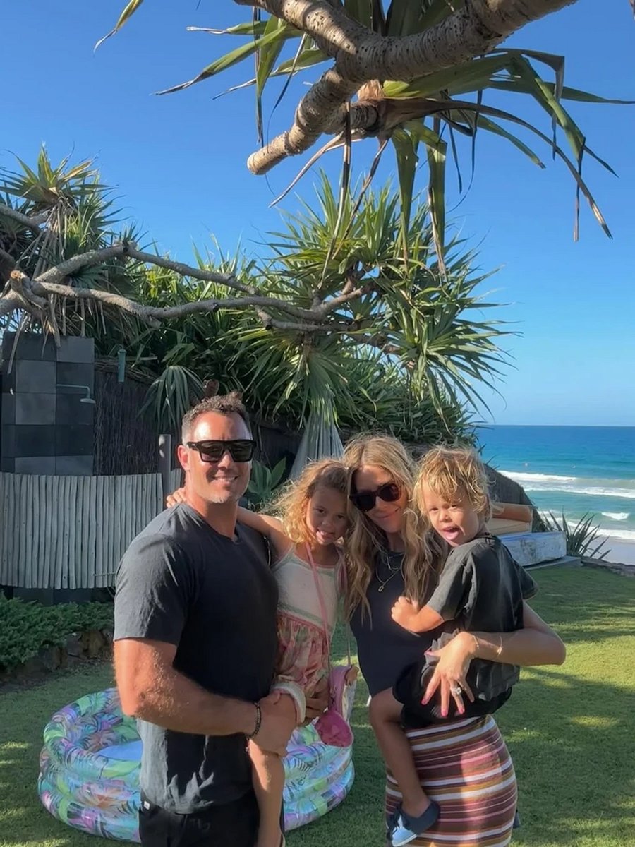 Jennifer Hawkins, her husband and their two children.