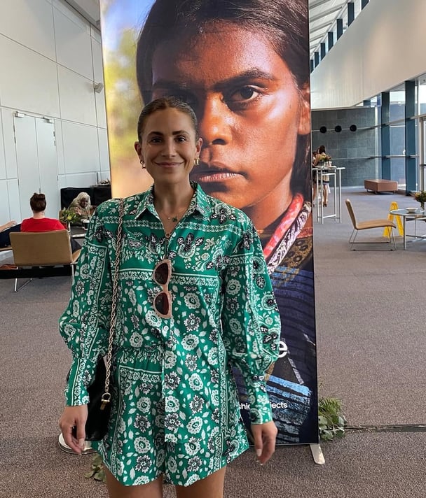Writer wears a green bandana print set.